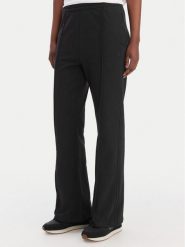 Calvin Klein Jeans Spodnie dresowe Archive Logo LV047B240G Czarny Regular Fit. Czarne spodnie dresowe Calvin Klein Jeans, xs, bez wzorów, z bawełny. Za 369.99 zł.