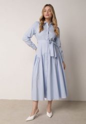 Niebieska Koszulowa Sukienka z Bawełną i Wiskozą Ozdobiona Paskiem Viviedah. Niebieskie sukienki Born2be, na co dzień, l, bez wzorów, z bawełny, bez kołnierzyka, bez ramiączek, maxi, koszulowe. Za 199.99 zł.