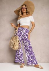 Fioletowe Spodnie High Waist z Wiskozy w Kwiaty z Szerokimi Nogawkami i Gumką w Pasie Gronea. Fioletowe spodnie materiałowe Renee, na co dzień, bez wzorów, z jeansu, z podwyższonym stanem. Za 39.99 zł.
