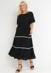 Czarna Rozkloszowana Sukienka Maxi Wiązana z Tyłu Zathia. Czarne sukienki Born2be, xl, w ażurowe wzory, z materiału, bez kołnierzyka, bez ramiączek, maxi, rozkloszowane. Za 109.99 zł.