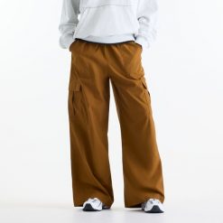 Spodnie damskie New Balance WP53504BFT – brązowe. Czarne spodnie dresowe New Balance, m, bez wzorów, z materiału. Za 329.99 zł.