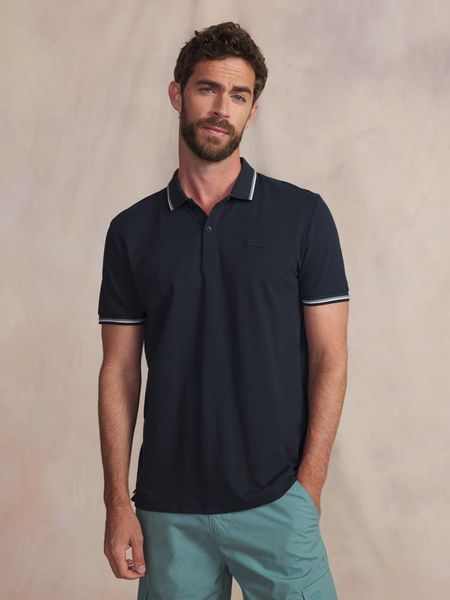 Polo TBS Yvane. Niebieskie koszulki polo Tbs, na lato, uniwersalny, bez wzorów, z bawełny, bez kołnierzyka, bez ramiączek. Za 255.50 zł.