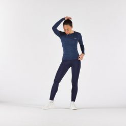 Legginsy do biegania damskie Kiprun Run 500 Warm ocieplane. Niebieskie legginsy KIPRUN, l, bez wzorów, z elastanu, do biegania. Za 139.99 zł.