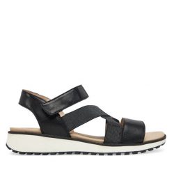 Sandały Caprice. Czarne sandały Caprice, bez wzorów, bez obcasa, na płaskiej podeszwie, bez zapięcia. Za 229.99 zł.