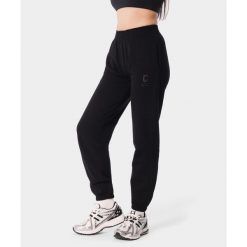 Spodnie dresowe sportowe dla kobiet Carpatree Varsity Chic. Czarne obuwie sportowe Carpatree, z dresówki, bez zapięcia, na fitness i siłownię. Za 249.99 zł.