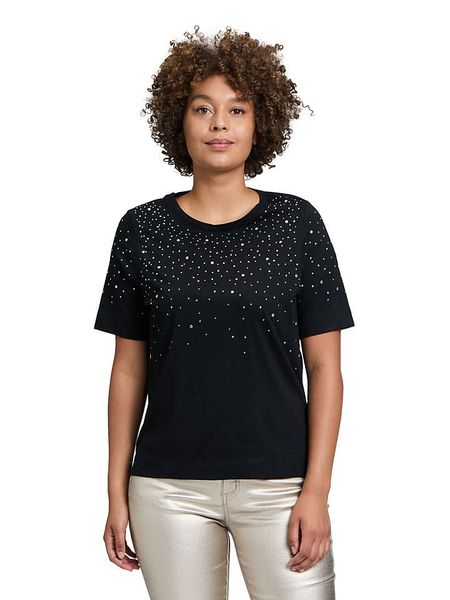 CARTOON Koszulka w kolorze czarnym rozmiar: 38. Czarne bluzki Cartoon, bez wzorów, z bawełny, bez kołnierzyka, bez ramiączek. Za 56.39 zł.