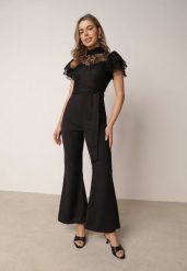 Czarny Elegancki Kombinezon VICES z Koronkową Górą i Rozszerzanymi Nogawkami Talinoe. Czarne sukienki Born2be, do pracy, l, bez wzorów, z koronki, biznesowe, bez kołnierzyka, bez ramiączek, kopertowe. Za 199.99 zł.