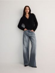 Jeansy wide leg z przetarciami - niebieski. Niebieskie jeansy Reserved, bez wzorów. W wyprzedaży za 89.99 zł.