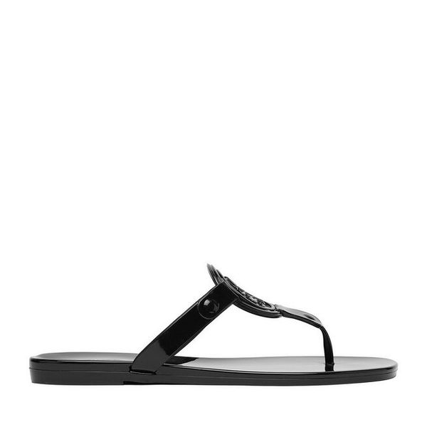 Japonki Nine West. Czarne klapki Nine West, bez wzorów, bez obcasa. Za 79.99 zł.