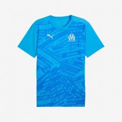 Koszulka piłkarska przedmeczowa Puma Olympique Marsylia 24/25. Bluzki Puma, s, bez wzorów, z materiału, sportowe, bez kołnierzyka, bez ramiączek. W wyprzedaży za 249.99 zł.