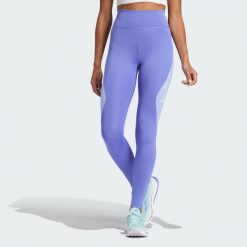 Legginsy Own The Run Colorblock Full-Length. Niebieskie legginsy sportowe Adidas, xs, bez wzorów, z elastanu, do biegania. Za 308.60 zł.