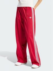 Adidas Spodnie dresowe 159027 Czerwony Loose Fit. Czerwone spodnie dresowe Adidas, xs, bez wzorów, z dresówki. Za 298.99 zł.