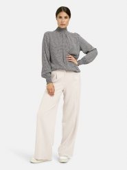 Milano Italy Bluzka w kolorze biało-czarnym rozmiar: 40. Białe bluzki Milano Italy, bez wzorów, z wiskozy, bez kołnierzyka, bez ramiączek. Za 173.99 zł.