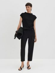 Someday Koszulka "Keala" w kolorze czarnym rozmiar: 38. Czarne bluzki someday., bez wzorów, bez kołnierzyka, bez ramiączek. Za 95.99 zł.