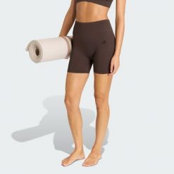 Legginsy Workout Essentials 4 inch. Brązowe legginsy Adidas, bez wzorów. Za 129.00 zł.