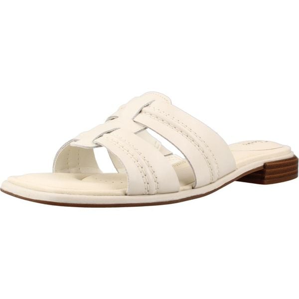 Sandały CLARKS ARIANY MULE Biały. Białe sandały Clarks, bez wzorów, ze skóry, bez obcasa, bez zapięcia. Za 216.99 zł.
