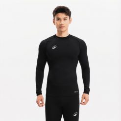Podkoszulek termiczny do piłki nożnej z długim rękawem Kipsta Keepcomfort 100. Czarne bielizna sportowa KIPSTA, xl, bez wzorów, z elastanu. Za 49.99 zł.