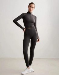 Damskie legginsy dłuższe, wysoki stan, invisible scrunch Shape Seamless szare. Szare legginsy AIM'N, xl, bez wzorów, z dzianiny, z podwyższonym stanem, długie. Za 301.00 zł.