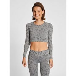 Damski bezszwowy crop top Hummel Mt Pi. Brązowe biustonosze Hummel, bez wzorów. Za 175.00 zł.