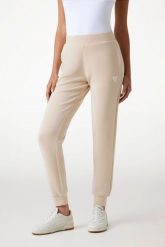 GUESS Spodnie damskie dresowe w kolorze taupe Olympe. Brązowe spodnie dresowe Guess, s, z aplikacjami, z dresówki. W wyprzedaży za 309.99 zł.
