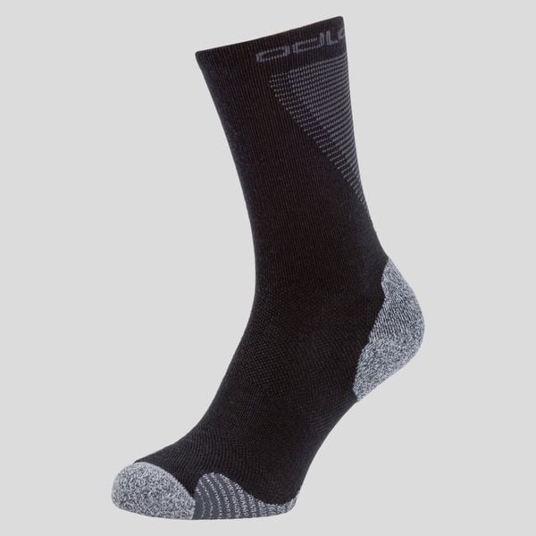 Skarpety Active Warm ODLO. Czarne skarpety Odlo, bez wzorów, z materiału. Za 96.60 zł.