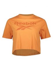 Reebok Koszulka w kolorze pomarańczowym rozmiar: S. Pomarańczowe bluzki Reebok, s, bez wzorów, bez kołnierzyka, bez ramiączek. Za 66.31 zł.