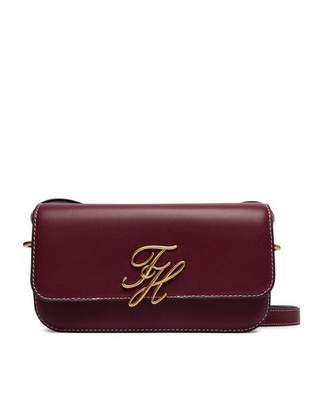 Tommy Hilfiger Torebka AW0AW18399 Czerwony ciemny. Czerwone listonoszki TOMMY HILFIGER, bez wzorów, ze skóry, bez dodatków. Za 849.99 zł.