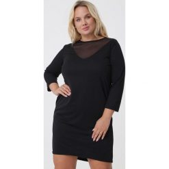 Czarna Sukienka Janice. Czarne sukienki Born2be, bez wzorów, z dzianiny, bez kołnierzyka, bez ramiączek, mini. Za 69.99 zł.