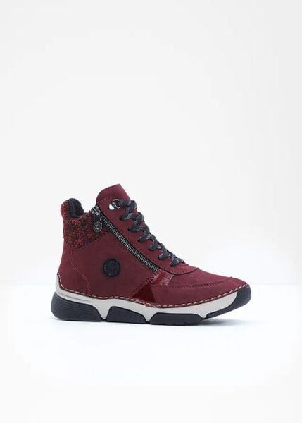 Botki sznurowane marki Rieker. Niebieskie botki bonprix, bez wzorów, bez obcasa, bez zapięcia. Za 369.99 zł.