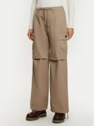 Converse Spodnie materiałowe 10026957-A03 Beżowy Relaxed Fit. Brązowe spodnie materiałowe Converse, xs, bez wzorów, z bawełny. Za 219.99 zł.