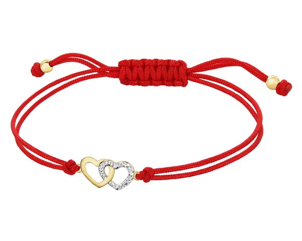 Bransoletka z elementami żółtego złota i diamentem - serca - 0,003 ct - próba 585. Żółte bransoletki Apart, z diamentem, złote. Za 959.00 zł.