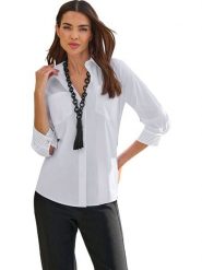 Heine Bluzka w kolorze białym rozmiar: 36. Białe bluzki Heine, bez wzorów, bez kołnierzyka, bez ramiączek. Za 65.45 zł.