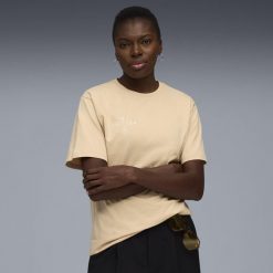 Damska koszulka piłkarska FtblEdition PUMA. Brązowe bluzki Puma, bez wzorów, sportowe, bez kołnierzyka, bez ramiączek. Za 129.00 zł.