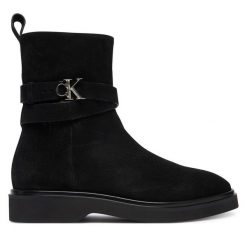 Botki Calvin Klein. Czarne botki Calvin Klein, bez wzorów, bez obcasa, na płaskiej podeszwie, bez zapięcia. Za 799.99 zł.