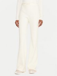 Guess Legginsy V5BB08 Z3JD2 Écru Flare Fit. Legginsy Guess, l, z aplikacjami, z syntetyku. Za 369.99 zł.