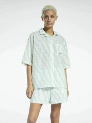 Reebok Koszula "Summer Waves" w kolorze zielonym rozmiar: S. Zielone koszule Reebok, s, bez wzorów, bez kołnierzyka, bez ramiączek. Za 74.81 zł.