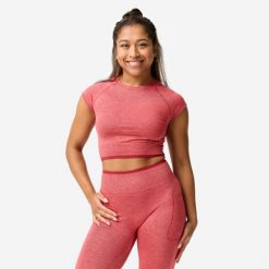 Koszulka do treningu siłowego damska Domyos crop top. Czerwone bluzki DOMYOS, xl, bez wzorów, z elastanu, bez kołnierzyka, bez ramiączek. Za 69.99 zł.