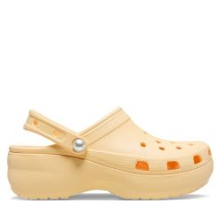 Klapki Crocs. Żółte klapki Crocs, bez wzorów, bez obcasa. Za 269.99 zł.