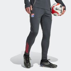 Spodnie piłkarskie treningowe ADIDAS Olympique Lyonnais 25/26. Spodnie dresowe Adidas, m, bez wzorów, z dresówki. Za 299.99 zł.