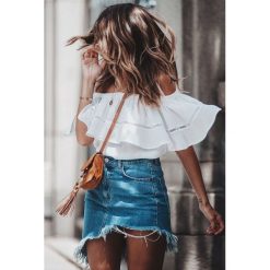 Top WHITY. Białe topy Top WHITY, l, bez wzorów, bez kołnierzyka, bez ramiączek. W wyprzedaży za 59.00 zł.