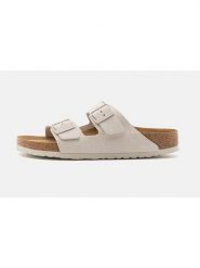 Birkenstock Skórzane klapki "Arizona" w kolorze kremowym rozmiar: 37. Brązowe klapki Birkenstock, bez wzorów, ze skóry, z otwartym noskiem, bez obcasa. Za 417.28 zł.