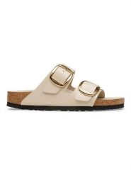 Birkenstock Skórzane klapki "Arizona Big Buckle" w kolorze kremowym rozmiar: 39. Brązowe klapki Birkenstock, bez wzorów, z otwartym noskiem, bez obcasa. Za 592.99 zł.