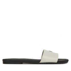 Klapki Calvin Klein Jeans. Białe klapki Calvin Klein Jeans, bez wzorów, z jeansu, bez obcasa. Za 209.99 zł.