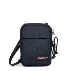 Torba na ramię Eastpak Buddy. Niebieskie torby na ramię Eastpak, bez wzorów, z denimu, eleganckie, na ramię, bez dodatków. Za 62.03 zł.