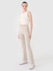 4F Legginsy z rozszerzanymi nogawkami damskie - beżowe L. Brązowe legginsy 4f, l, bez wzorów, z bawełny, z podwyższonym stanem, długie. Za 99.99 zł.