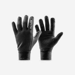Rękawiczki piłkarskie Kipsta Keepwarm. Czarne rękawiczki KIPSTA, bez wzorów, z materiału, sportowe. W wyprzedaży za 39.99 zł.
