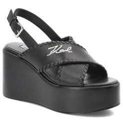 Czarne Sandały Karl Lagerfeld Eleganckie Obuwie Damskie Premium. Czarne sandały KARL LAGERFELD, bez wzorów, ze skóry, eleganckie, bez obcasa, na koturnie, bez zapięcia. Za 827.99 zł.