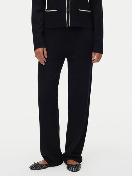 Vero Moda Spodnie dzianinowe Gold 10337637 Czarny Loose Fit. Czarne spodnie materiałowe Vero Moda, s, bez wzorów, z dzianiny. Za 199.99 zł.