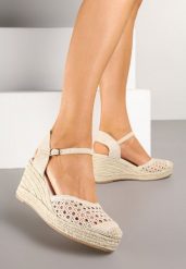 Beżowe Ażurowe Sandały Espadryle na Plecionym Koturnie ze Skórzaną Wkładką Terreina. Brązowe sandały Renee, w ażurowe wzory, eleganckie, bez obcasa, na koturnie, bez zapięcia. W wyprzedaży za 84.49 zł.