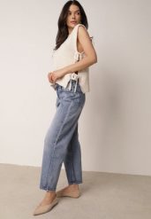 Niebieskie Bawełniane Jeansy Mom Fit o Klasycznym Kroju z Wysokim Stanem Esersia. Niebieskie spodnie materiałowe Born2be, do pracy, l, bez wzorów, z bawełny, z podwyższonym stanem, długie. Za 99.99 zł.